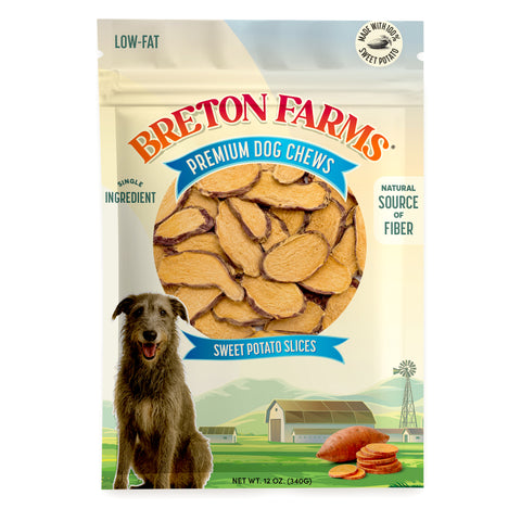 A 12 oz bag of Breton Farms Premium Dog Chews in Sweet Potato Slices flavor. The packaging features a large clear window showing the natural sweet potato slices inside, with an illustration of a brown dog and a farm scene at the bottom.