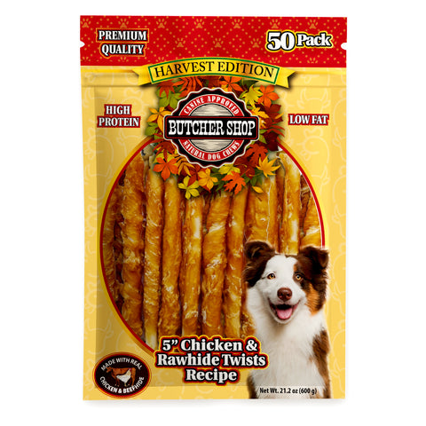 A 50-pack bag of Butcher Shop Harvest Edition Chicken & Rawhide Twists dog treats. The packaging is yellow and red with a circular window showing the golden-brown twisted treats inside, and a smiling dog on the lower right.