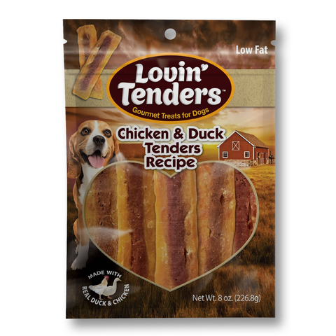 A package of Lovin Tenders dog treats, Chicken & Duck Tenders Recipe, 8 oz. The packaging features a brown and beige design with a picture of a beagle, a barn, and a heart-shaped clear window showing the golden-brown tenders inside.