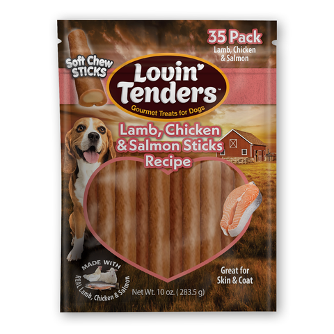 A package of Lovin' Tenders dog treats, specifically the Lamb, Chicken & Salmon Soft Chew Sticks recipe in a 35 pack. The packaging features a brown and orange farm background with a picture of a beagle dog, a barn, and a heart-shaped window showing the brown cylindrical treats inside.