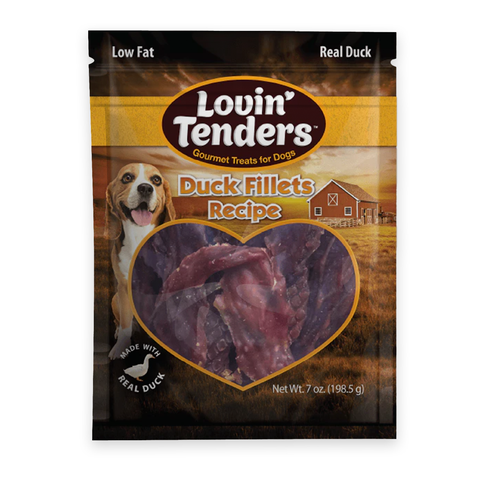 A package of Lovin' Tenders Duck Fillets Recipe dog treats, featuring a heart-shaped window showing the raw meat treats inside, with a beagle and barn illustration on the packaging.