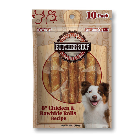 A 10-pack of Butcher Shop dog treats, specifically the 8-inch Chicken & Rawhide Rolls recipe. The treats are visible through a clear circular window on the front of the wooden-textured packaging, which also features a smiling dog illustration and text highlighting 'Low Fat' and 'High Protein'.