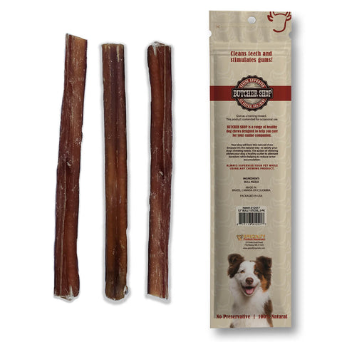 Three brown dog chew sticks shown next to their retail packaging bag on a plain white background. The packaging features a beige background with a picture of a dog and the brand name Butcher Shop.