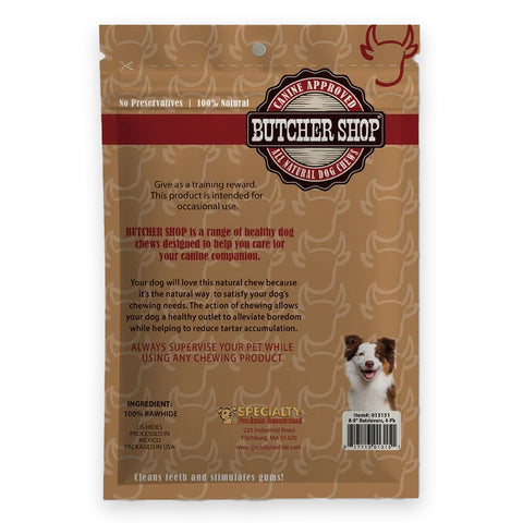 Back side of a dog chew pouch from Butcher Shop, showing product details, ingredients, a small dog photo, and a barcode on a brown background with a subtle dog bone pattern.