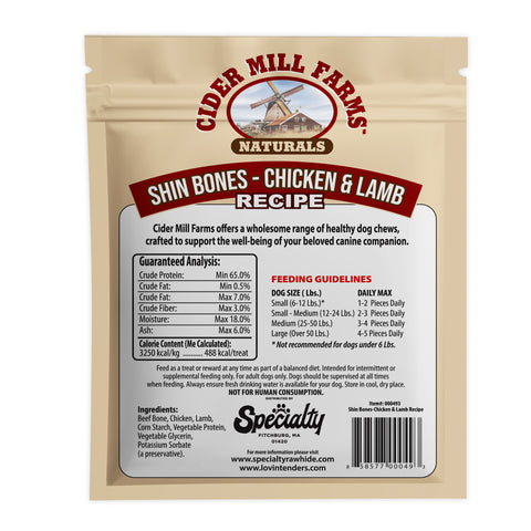 Back view of a Cider Mill Farms Naturals Shin Bones - Chicken & Lamb recipe dog chew pouch, showing product details, guaranteed analysis, feeding guidelines, ingredients, and a barcode.
