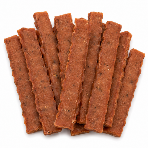 A pile of brown, textured rectangular sticks or crackers arranged in a fan shape on a plain white background.