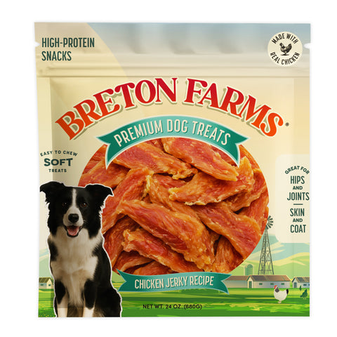 A 24 oz bag of Breton Farms Premium Dog Treats, Chicken Jerky Recipe, featuring a black and white border collie on the front packaging over a farm illustration.
