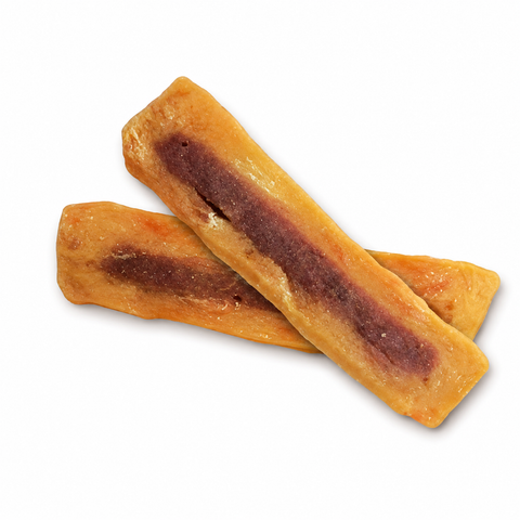Two golden-brown baked sticks with a dark reddish-brown center filling, arranged diagonally on a plain white background.