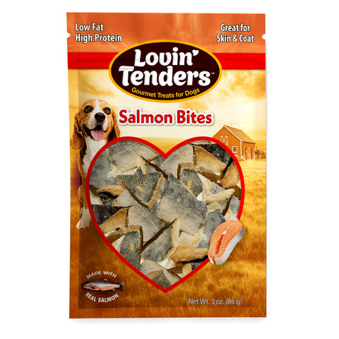 A 3 oz bag of Lovin' Tenders Salmon Bites gourmet dog treats, featuring a golden-brown package design with a heart-shaped window showing the fish-shaped treats inside, a beagle dog illustration, and a salmon slice graphic.