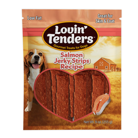 A 9 oz bag of Lovin' Tenders Salmon Jerky Strips Recipe dog treats, featuring a brown and orange package design with a picture of a beagle, a barn illustration, and a heart-shaped window showing the reddish-brown jerky strips inside.