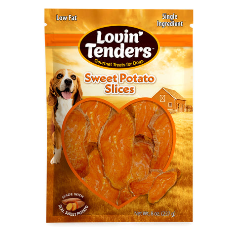 A bag of Lovin' Tenders Sweet Potato Slices dog treats, featuring a heart-shaped window showing the orange-brown treats inside, with a beagle and a barn graphic on the packaging.