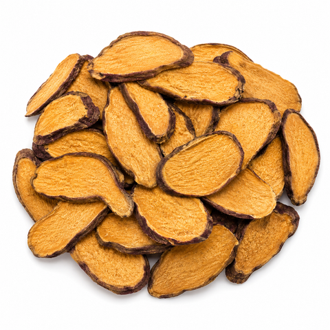 A pile of dried sweet potato slices with golden-yellow interiors and dark brown edges, photographed on a clean white background.